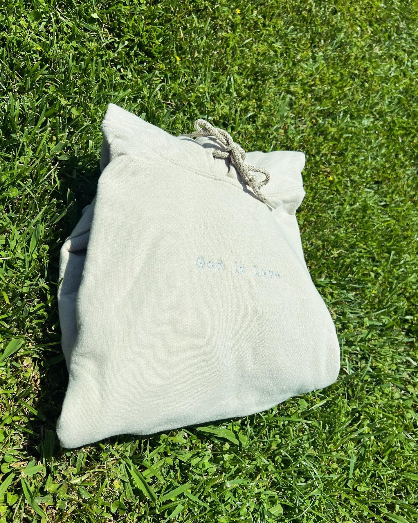 BEIGE GOD IS LOVE HOODIE